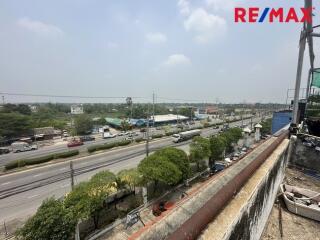 Outdoor view from the building showing a road and surroundings