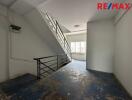 Staircase area in a building with natural lighting