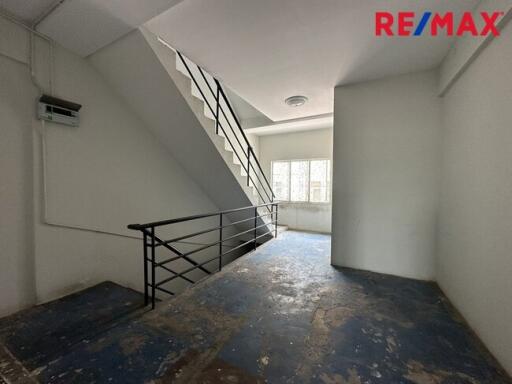 Staircase area in a building with natural lighting