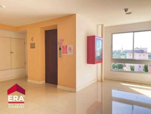 Elevator lobby with window view in a residential building