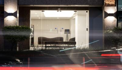 Modern building lobby with seating and lamp