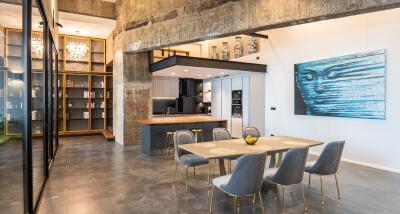 Modern industrial kitchen and dining area