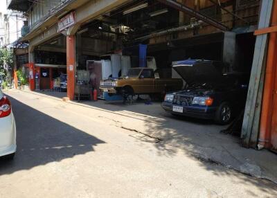 Spacious garage area with parked vehicles