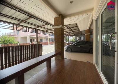 Spacious carport with covered area