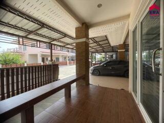 Spacious carport with covered area