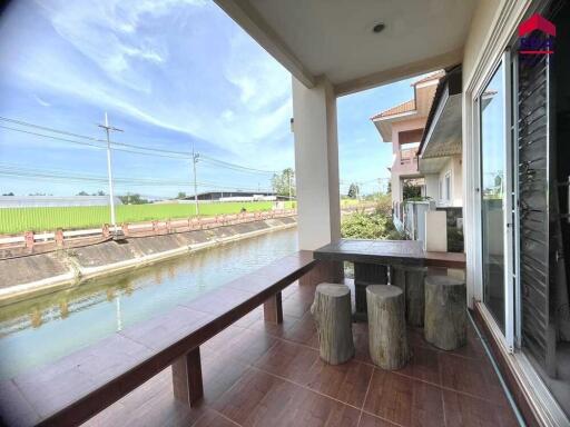 Covered patio with water view