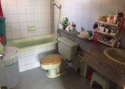 Bathroom with bathtub and sink