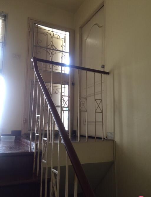 Indoor staircase with safety railing