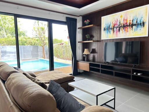 Living room with pool view