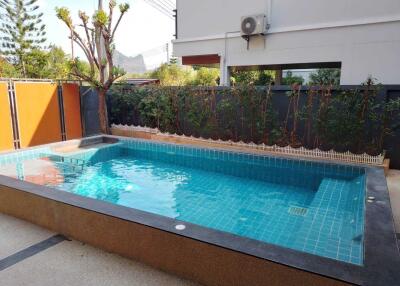 Private swimming pool in backyard