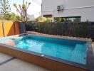 Private swimming pool in backyard