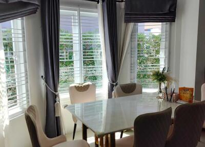 Bright dining room with table and chairs