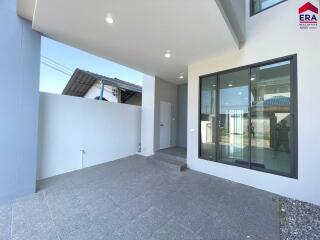 Modern building exterior with a partially covered outdoor area