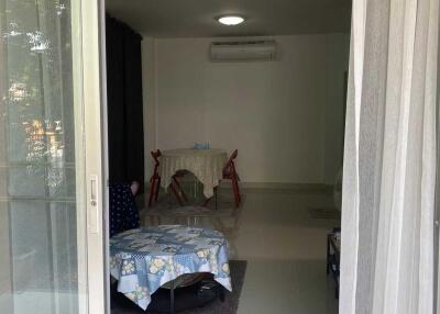 Living room with air conditioning viewed from the balcony