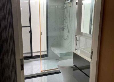 Modern bathroom with glass shower enclosure