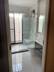 Modern bathroom with glass shower enclosure