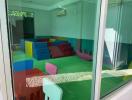 Children's Playroom with Colorful Soft Blocks and Furniture