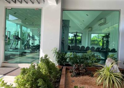 Modern fitness room with exercise equipment