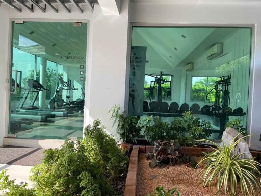 Modern fitness room with exercise equipment