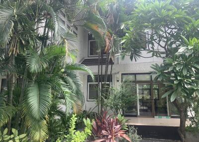 Exterior view of a house with lush greenery