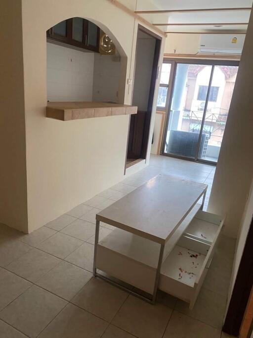 Main living area with open counter and sliding glass doors