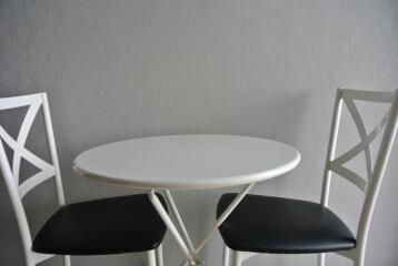 Small dining table with two chairs