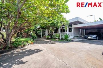 Exterior view of residential property with carport