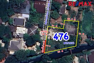 Aerial view of a land plot with dimensions marked