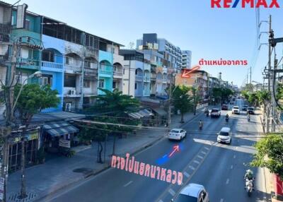 Street view with buildings and road traffic