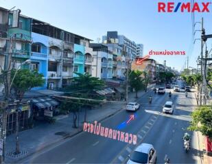 Street view with buildings and road traffic