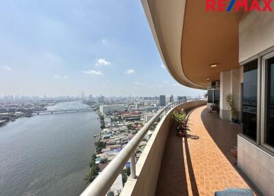 Spacious balcony with river and city views