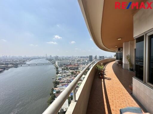 Spacious balcony with river and city views