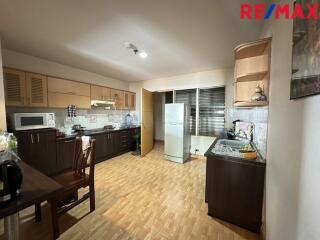 Spacious kitchen with modern appliances and ample storage