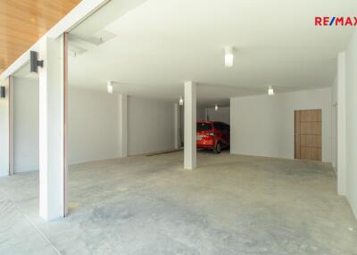 Spacious garage with a parked car