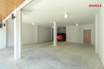 Spacious garage with a parked car