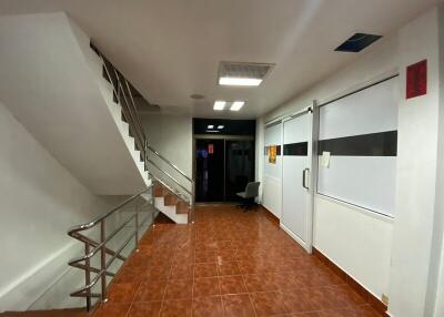 Interior view of an entrance or hallway with stairs