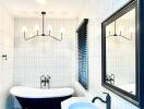 Modern bathroom with a freestanding bathtub and a vessel sink