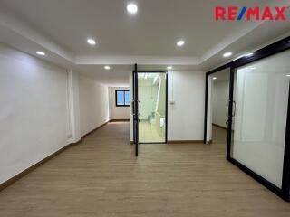 Interior view of a modern living space with glass sliding doors