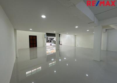 Spacious empty room with polished floors