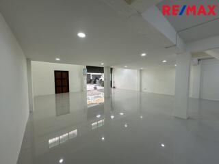 Spacious empty room with polished floors