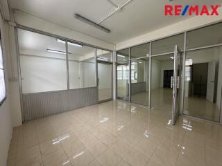 Spacious commercial area with glass partitions