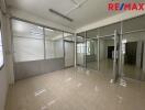 Spacious commercial area with glass partitions