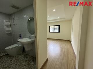 Bathroom and adjoining empty room