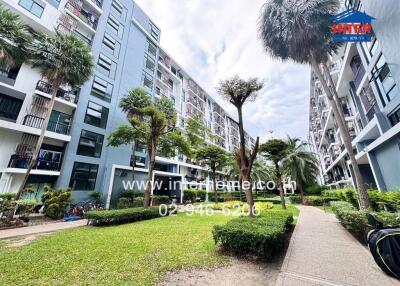 Apartment complex with green courtyard