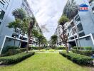 Exterior view of the apartment complex with landscaped garden