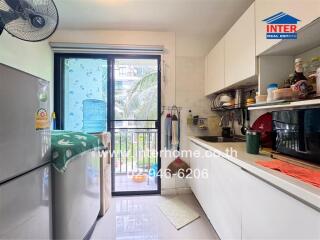 Modern kitchen with balcony view