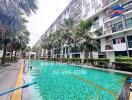 Outdoor view of a residential building with swimming pool