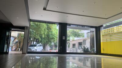 Modern lobby with large windows and polished floors