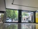 Modern lobby with large windows and polished floors