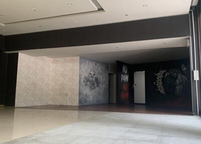 Empty commercial space with wall art
